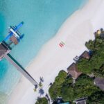 Aerial view of a tropical island resort.