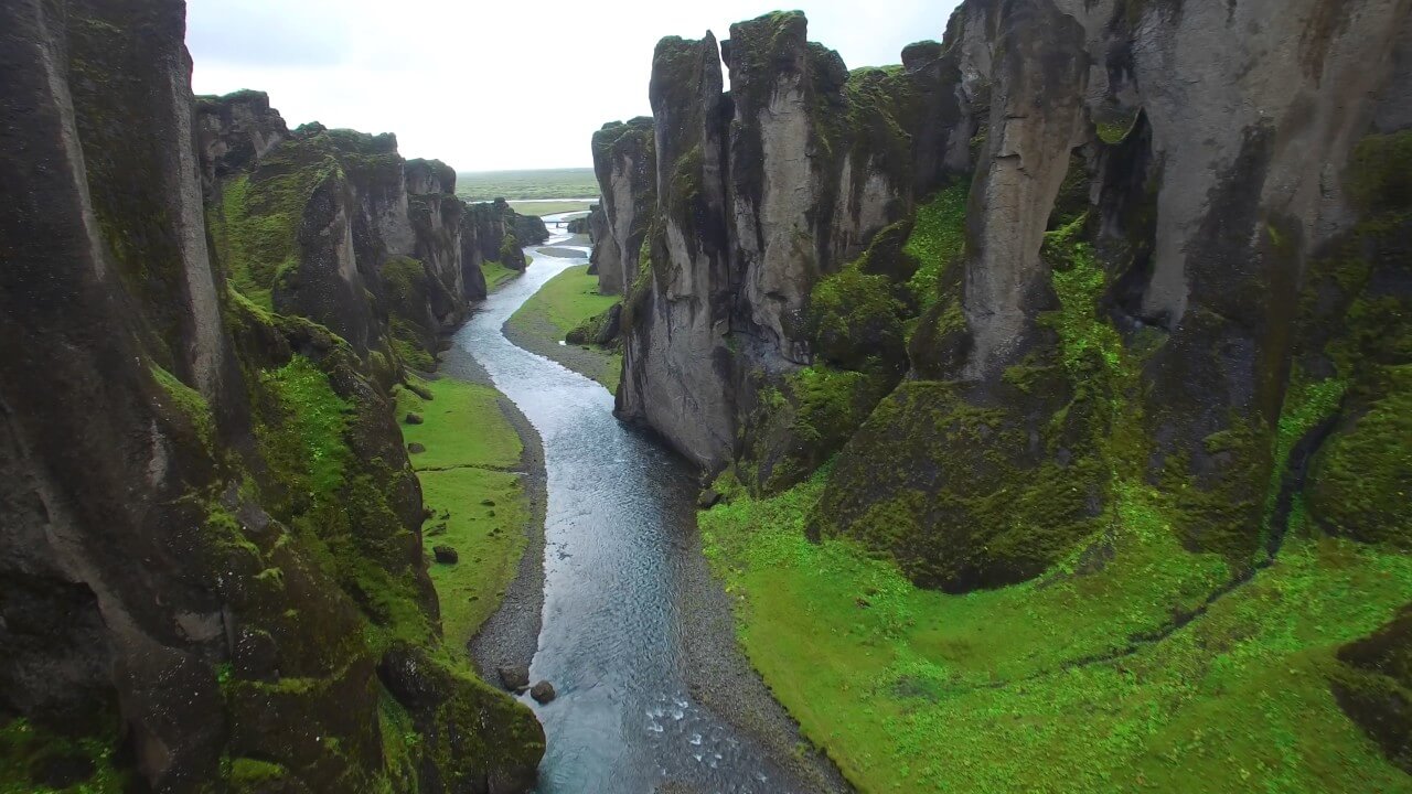 Aerial view of a river flowing through a canyon.